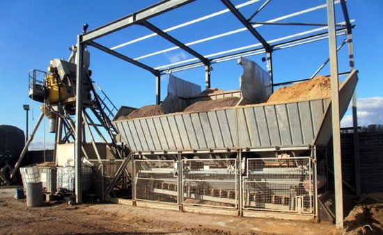 Used mobile batching plant showing 3 - 6 aggregate bin storage
